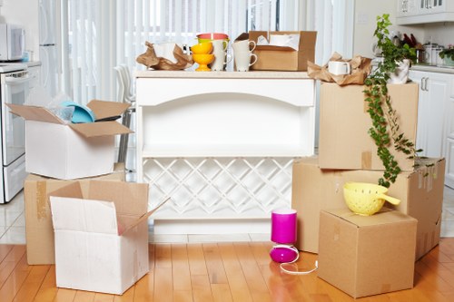 Professional movers loading items for removal services in Shoreditch