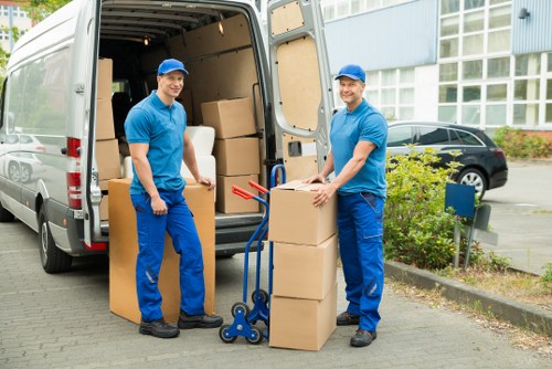 Professional movers packing household items in Shoreditch