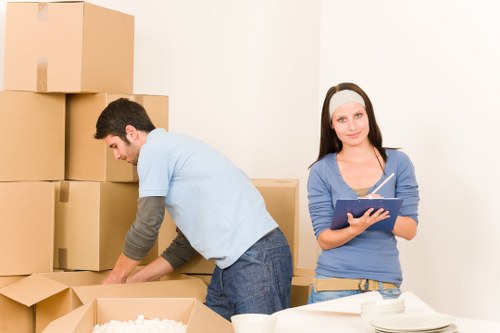 Student moving supplies and labelled boxes in Shoreditch