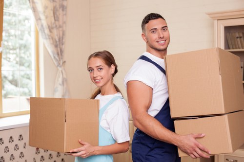 Cardboard and furniture being separated for recycling in East London