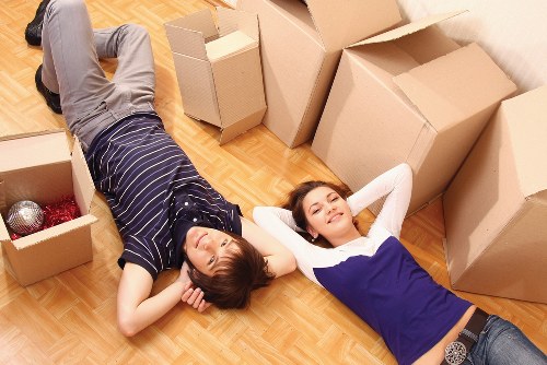 Professional movers handling furniture in Shoreditch