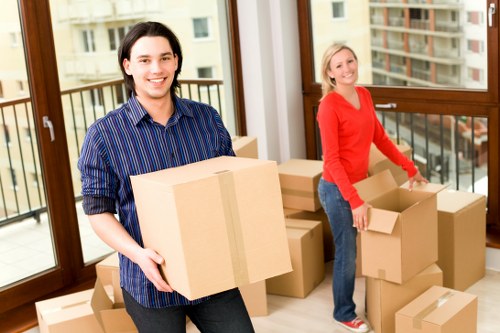 Professional packers preparing boxes for a move in Shoreditch